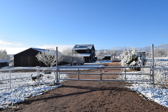 yard layered in snow with fence