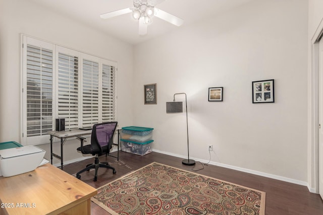 office featuring wood finished floors, baseboards, and ceiling fan