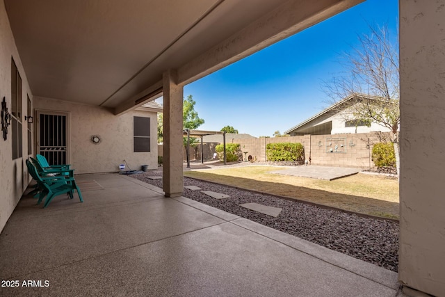 view of patio / terrace with fence