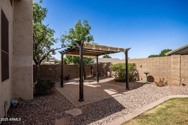 view of patio featuring a fenced backyard and a pergola