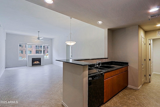 kitchen with black dishwasher, a sink, baseboards, ceiling fan, and light tile patterned flooring