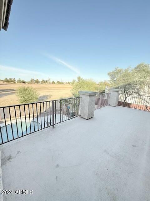 balcony featuring a patio area