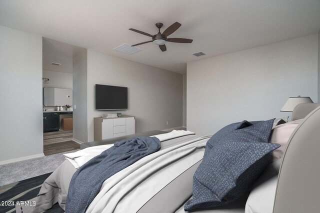 carpeted bedroom featuring ceiling fan