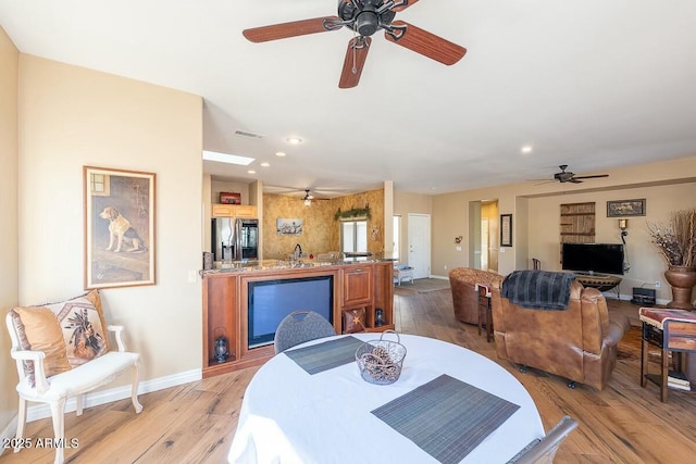 dining area featuring light hardwood / wood-style flooring