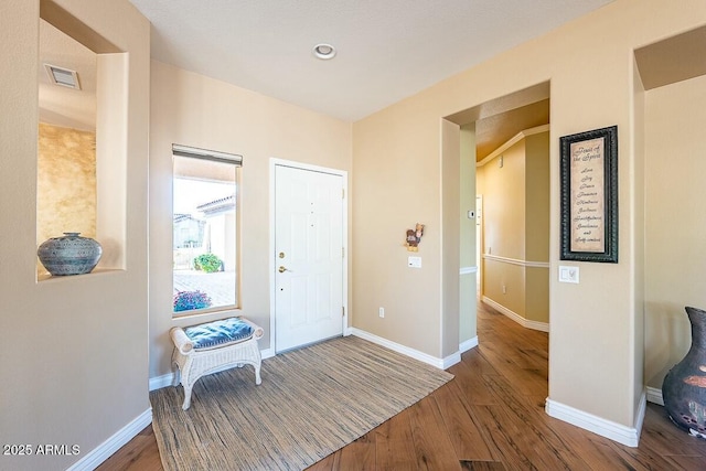 foyer entrance featuring hardwood / wood-style floors