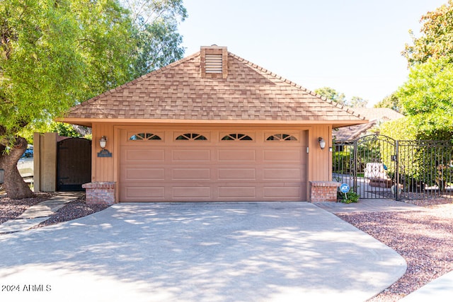 exterior space with an outdoor structure and a garage