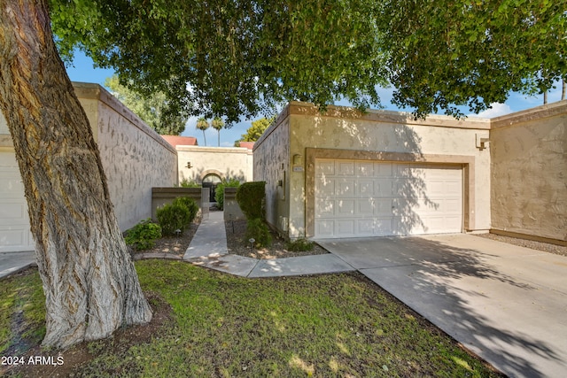 view of side of home with a garage