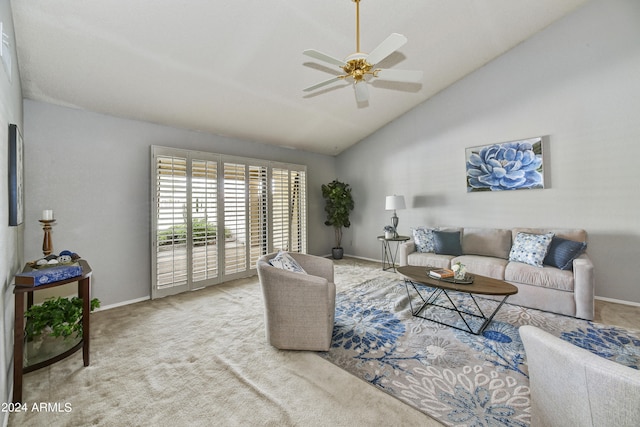 carpeted living room featuring vaulted ceiling and ceiling fan