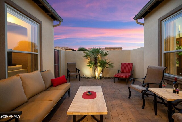 12904 W Dale Ln, Peoria, AZ 85383 - patio terrace at dusk featuring outdoor lounge area and fence