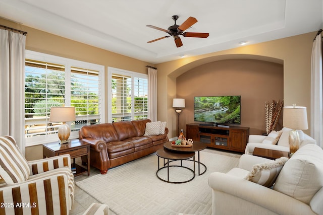 12904 W Dale Ln, Peoria, AZ 85383 - living area featuring ceiling fan and a tray ceiling