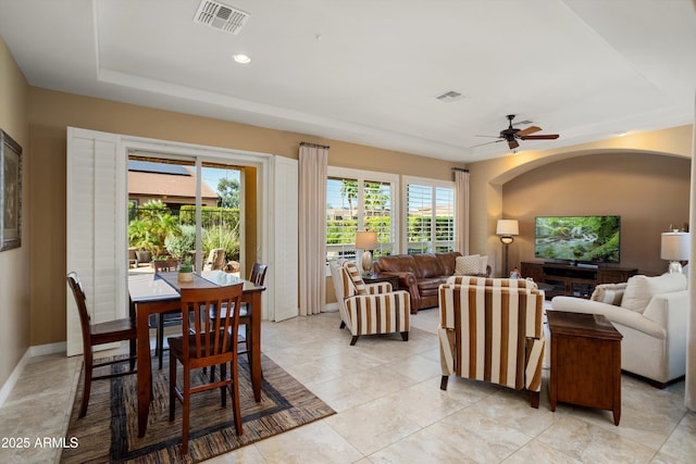 12904 W Dale Ln, Peoria, AZ 85383 - dining space with plenty of natural light, a ceiling fan, baseboards, a tray ceiling, and recessed lighting