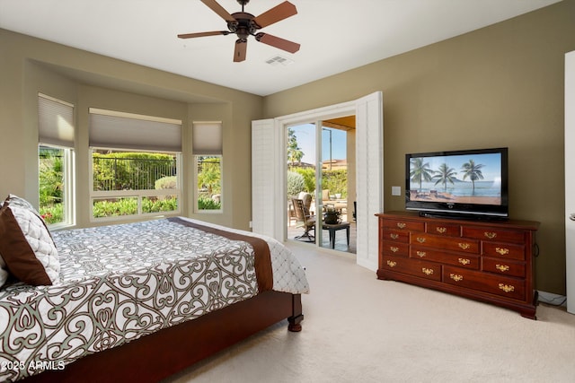 12904 W Dale Ln, Peoria, AZ 85383 - carpeted bedroom with access to exterior and a ceiling fan