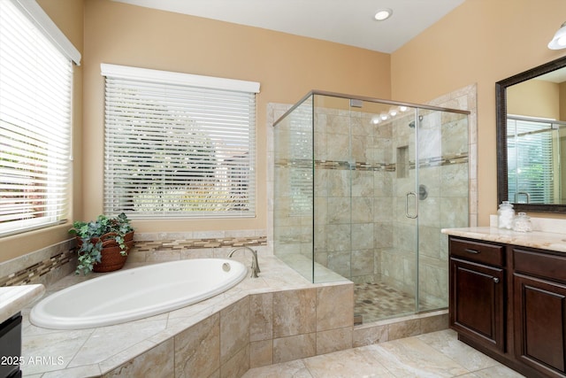 12904 W Dale Ln, Peoria, AZ 85383 - bathroom with vanity, a stall shower, and a bath