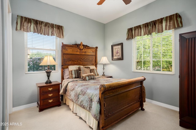12904 W Dale Ln, Peoria, AZ 85383 - bedroom with light carpet, baseboards, and ceiling fan