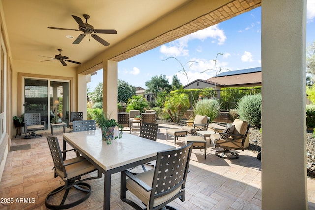 12904 W Dale Ln, Peoria, AZ 85383 - view of patio featuring outdoor dining area, a fenced backyard, and a ceiling fan
