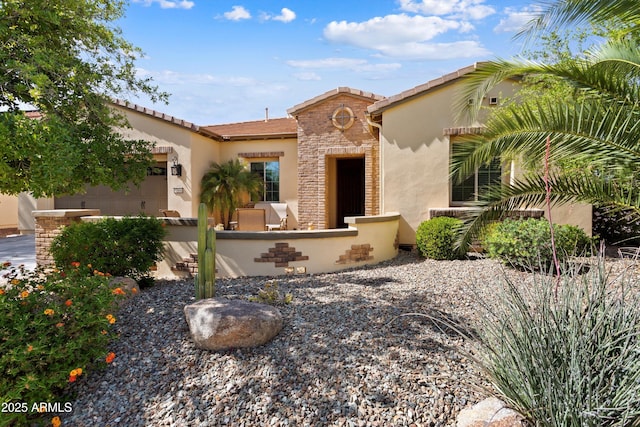 12904 W Dale Ln, Peoria, AZ 85383 - mediterranean / spanish-style home with stucco siding and a garage