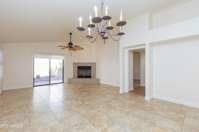 unfurnished living room with high vaulted ceiling, baseboards, ceiling fan with notable chandelier, and a glass covered fireplace