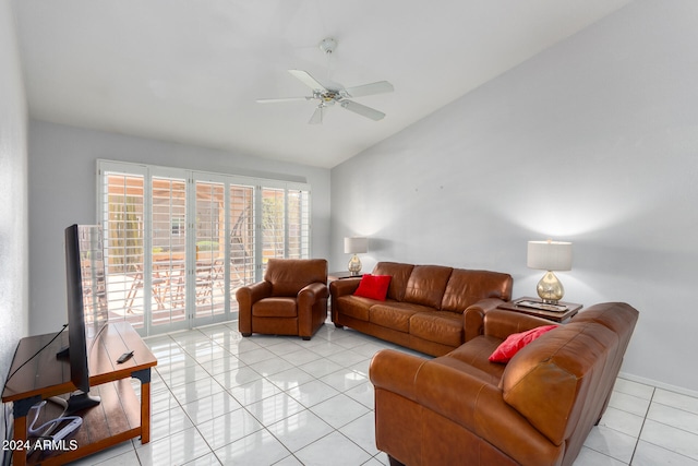 tiled living room with lofted ceiling and ceiling fan