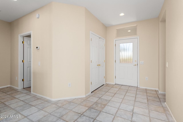 view of tiled foyer entrance