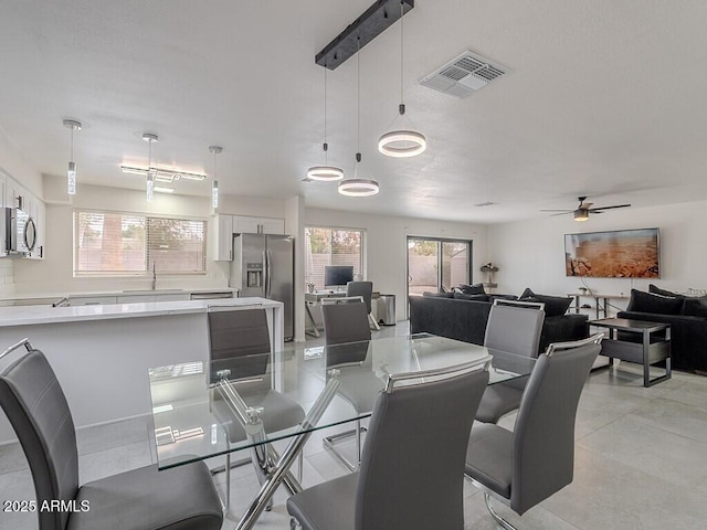 5817 S Siesta Ln, Tempe, AZ 85283 - dining room with plenty of natural light and ceiling fan