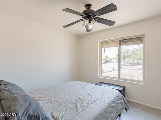 5817 S Siesta Ln, Tempe, AZ 85283 - bedroom with carpet floors, baseboards, and a ceiling fan