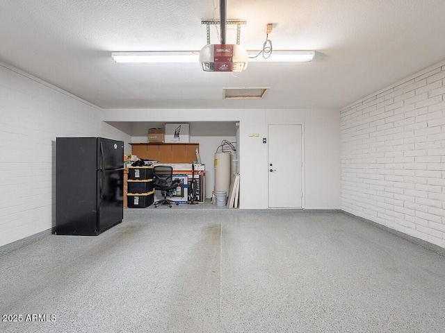 5817 S Siesta Ln, Tempe, AZ 85283 - garage featuring freestanding refrigerator and a garage door opener
