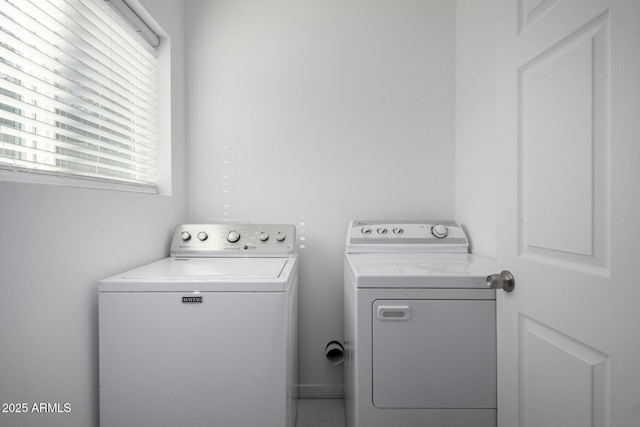 laundry room with laundry area and washing machine and dryer