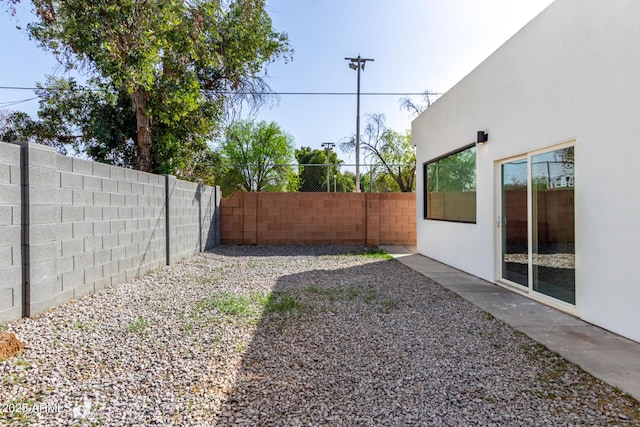 view of yard featuring a fenced backyard