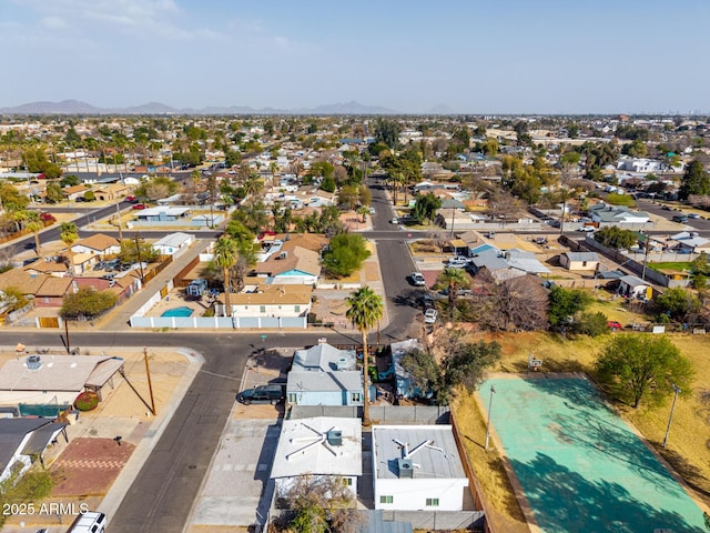 drone / aerial view featuring a mountain view and a residential view