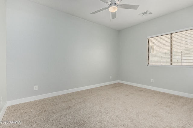 9224 W Raymond St, Tolleson, AZ 85353 - carpeted spare room featuring baseboards and a ceiling fan
