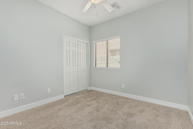 9224 W Raymond St, Tolleson, AZ 85353 - unfurnished bedroom with carpet, a closet, and ceiling fan