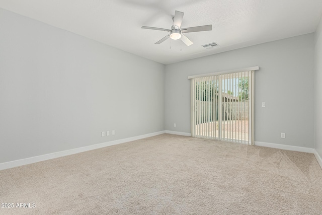9224 W Raymond St, Tolleson, AZ 85353 - carpeted spare room with a ceiling fan and baseboards