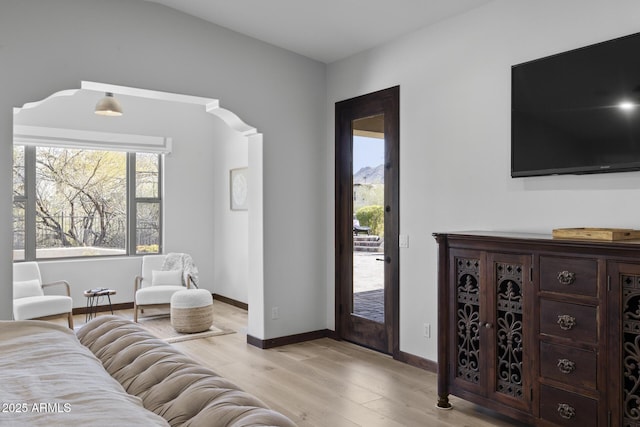 bedroom with light hardwood / wood-style flooring and access to outside