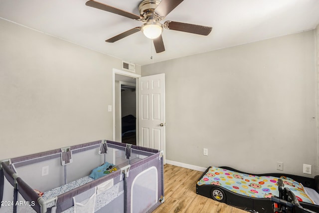 recreation room with light hardwood / wood-style flooring and ceiling fan