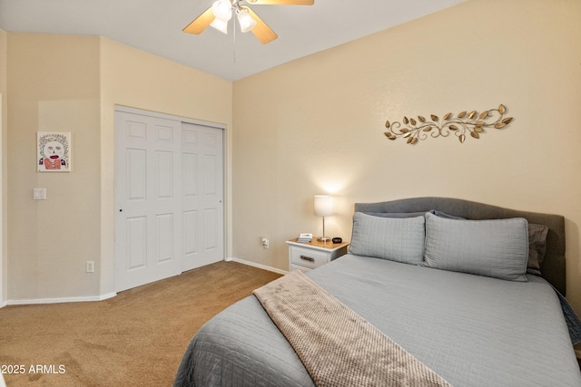 bedroom with a closet, ceiling fan, baseboards, and carpet floors