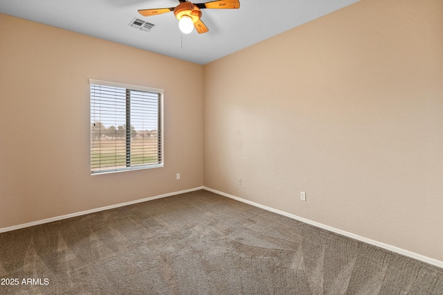 unfurnished room featuring visible vents, baseboards, carpet, and ceiling fan