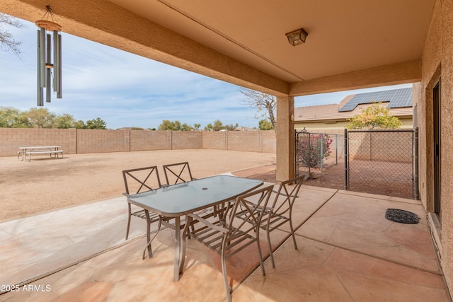 view of patio / terrace featuring outdoor dining space and a fenced backyard