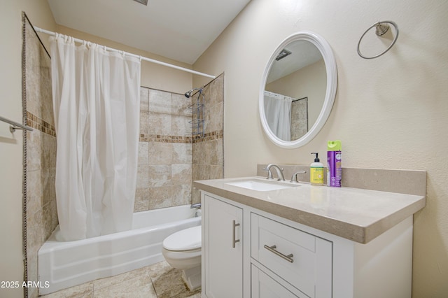 10620 W Clair Dr, Sun City, AZ 85351 - bathroom featuring shower / bath combo with shower curtain, vanity, and toilet