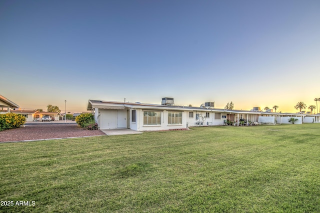 10620 W Clair Dr, Sun City, AZ 85351 - view of front facade with a yard