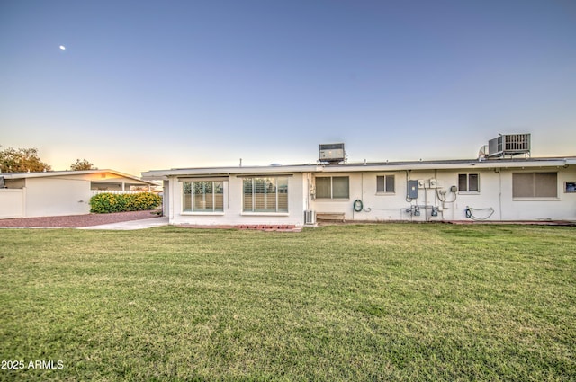 10620 W Clair Dr, Sun City, AZ 85351 - view of front of home featuring central AC unit and a front yard