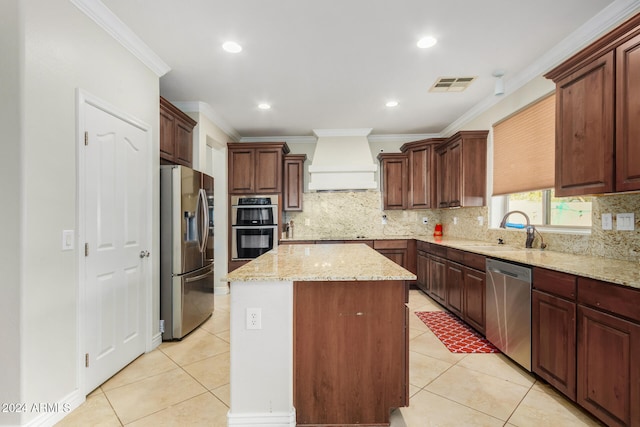 kitchen featuring a center island, light tile patterned flooring, premium range hood, and stainless steel appliances