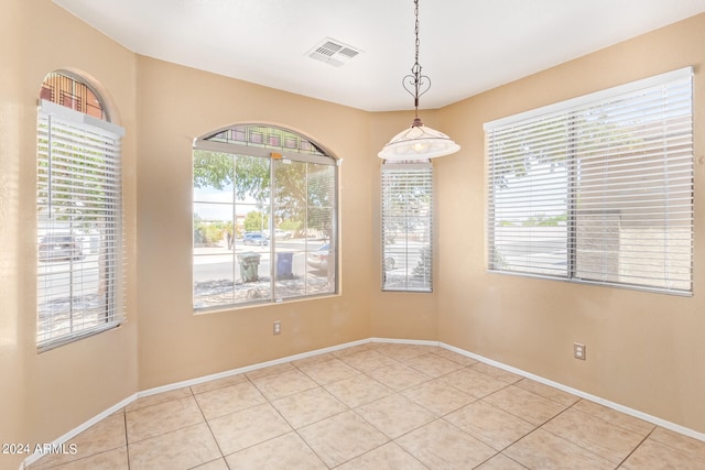 view of tiled spare room