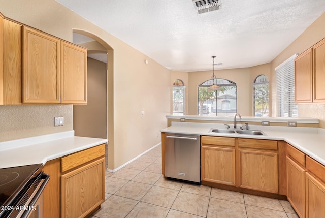 kitchen with decorative light fixtures, dishwasher, kitchen peninsula, and sink