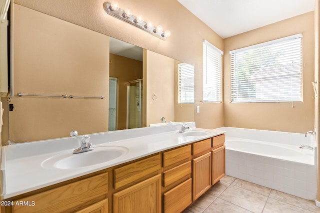 bathroom with vanity, plus walk in shower, and tile patterned floors