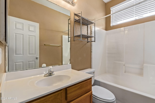 full bathroom with toilet,  shower combination, and vanity