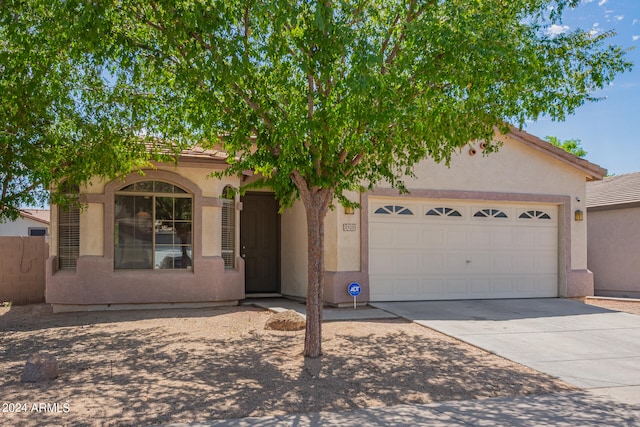 view of front of home with a garage