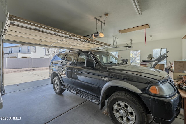 garage featuring a garage door opener