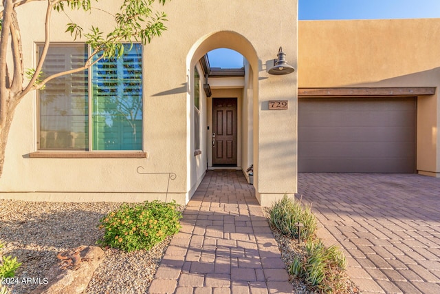 property entrance featuring a garage