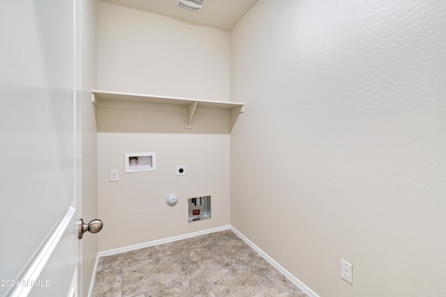 washroom featuring laundry area, baseboards, gas dryer hookup, hookup for an electric dryer, and washer hookup