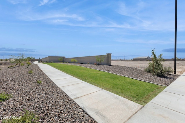 view of property's community with fence